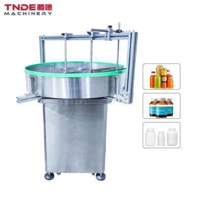 China Medical ; cosmetics; TDL-800 Small Glass Bottle Turntable Biological Accumulation Automatic Bottle Feeding Machine for sale