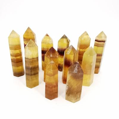 China Wholesale high quality natural yellow crystal point fengshui point fluorite Europe healing crystal tower for home decoration for sale