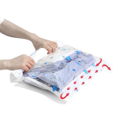 China Sustainable Travel Space Saver Bags Traveling Hand Roll Up Vacuum Compression Bag For Suitcase Travel Storage Bag for sale