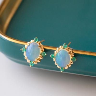 China Fashionable Oval Opal Earrings Light Blue Stone Flower Shape with Emeralds in Real Solid 14K Gold for sale