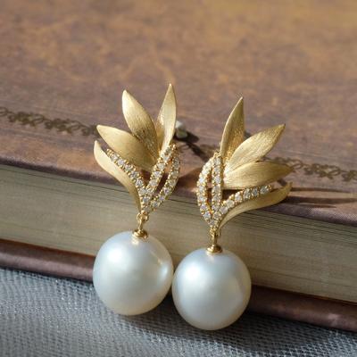 China Cute 10-11MM Akoya Pearl Dangle Earrings Wing Shape Leaf Ear Studs Diamonds and 14K Yellow Gold for sale