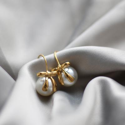 China Christmas Aretas Bowknot Bowknot Butterfly Stud Earring Jewelry Gold Pearl Circle 316l Imitation Gold Elegant Imitation Lead Free Nickel Free Earrings 18k Stainless for sale