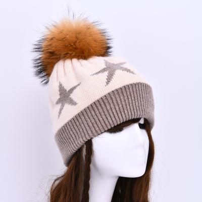 China New Design JOINT Star Hot Striped Wholesale Knitted Women's Real Fur Pom Pom Winter Knitted Hat for sale