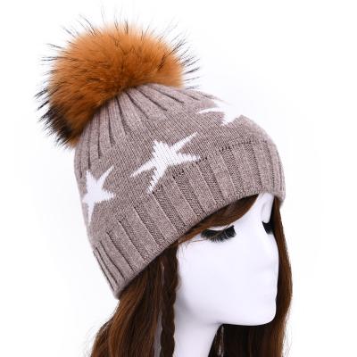 China breathable & Wholesale Lady Knit Cashmere Beanie Hat Raccoon Fur Pom Pom Women Knitted Wool Waterproof Classic Style Hat for sale