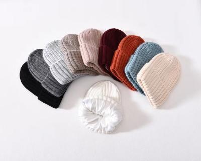 China COMMON Wholesale Custom Unisex Multi Color Design Logo Knit Winter Knitted Hat With Satin Lining for sale