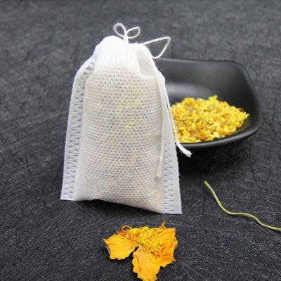 China Custom Logo Eco-friendly Filter Pouch PLA Non Woven Fold Tea Bags For Tea Packaging Heat Seal Customized for sale