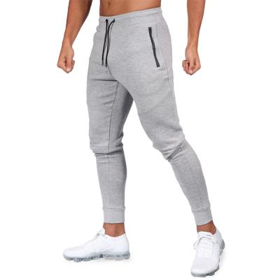 China 2020 Single Zipper Pocket OEM Cotton Spandex Zipper Pockets Slim Fit Mens Joggers for sale