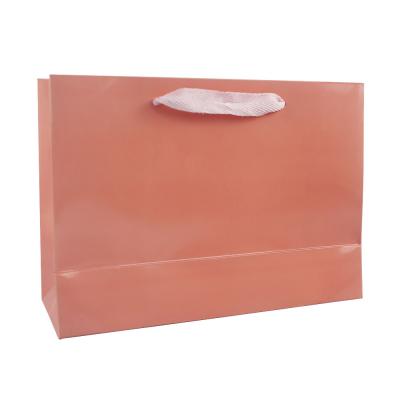 China Recycled Materials Paper Bag Pink Paper Bags With Handles Gift Paper Bag With Handle for sale