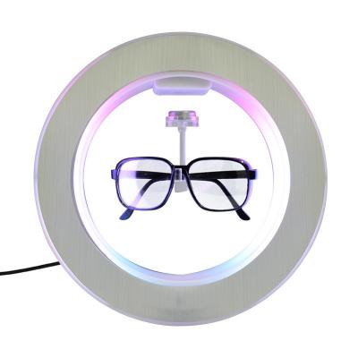 China Eco-friendly Cheap Rotating Levitating Display Glasses Magnetic Levitation Price Sunglasses Show Rack For Bottle Glasses for sale