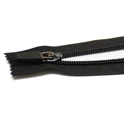 China NO.7 Sustainable Customized Nylon Zipper Narrow End With Metal Slider Pull For Garment And Jeans for sale