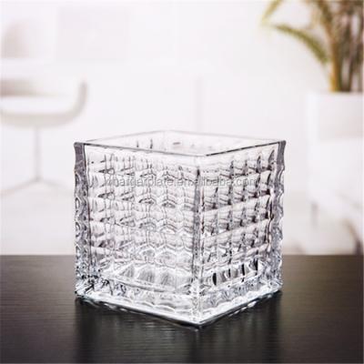 China Modern Art Unique Cheap Crystal Flower Vase With Embossed Pattern for sale