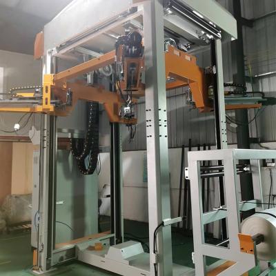 China Maquinaria automática de embalaje de alimentos Equipo de embalaje Botellas de vidrio Sistema de embalaje de estiramiento en frío en venta