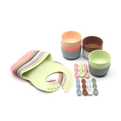 China Baby Food Grade Microwavable Silicone Dinner Set Hot Selling Feeding Bowl with Bib and Spoon Set of 3 for sale