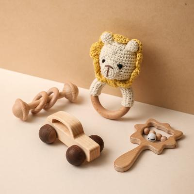 China Natural Eco-Friendly Newborn Gift Set Wooden Rattle Toy Baby Supplies Set Wholesale from Teether for sale