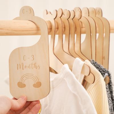 China Eco-freindly baby products clothes board embossed pure wood clothes board wholesale for sale