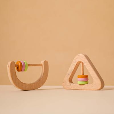 China Attract baby's attention hand bells natural wooden soft surface to make a noise to attract your baby's attention toy for sale