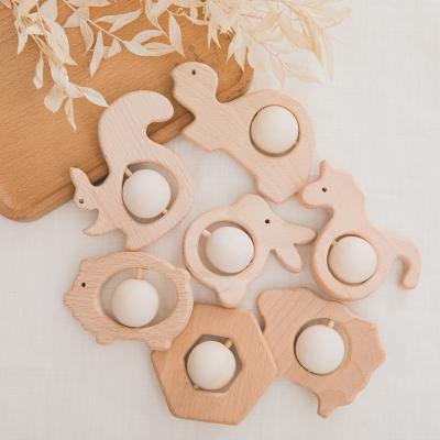 China Natural Eco-friendly Animal Ball Teether Jingle Wooden Teether Baby Molar Toys Wholesale for sale