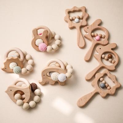 China Toy Baby Teether Hand-Cranked Rattle Soft Molar Baby Products Wooden Teether Toys Wholesale for sale