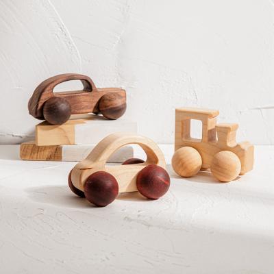 China High-end Handmade Wooden Car Eco-friendly Natural Toy Set Baby Wooden Teether Clink Soothing Toy for sale