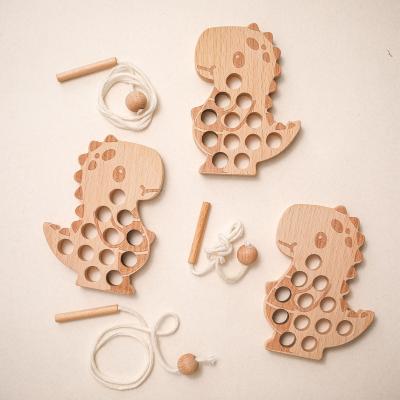 China eco-friendly & BPA Free Montessori Benefit Wisdom Toy Baby Wooden Toy Dinosaur Stringing Board Wholesale for sale