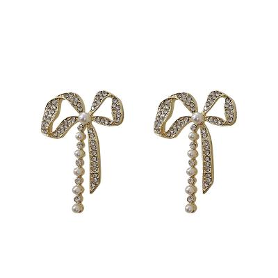 China High Quality Bowknot Shape Pearl Drop Earrings Women Fashion Pearl Stainless Steel Earrings for sale