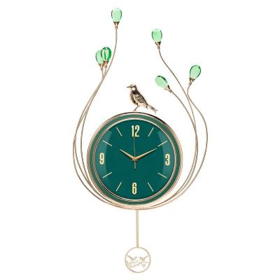 China Beautiful Light Luxury Peacock Wall Clock In Green Creative Fashion Quartz Clock Silent Wall Hanging Decoration for sale