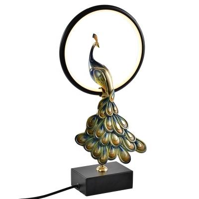 China Beautiful creative copper peacock stage lamp desktop ornaments in SM size home decoration living room for sale