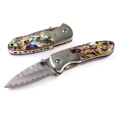 China Easy Carry Small Damascus Steel Folding Pocket Knife With Copper Abalone And Natural Shell for sale