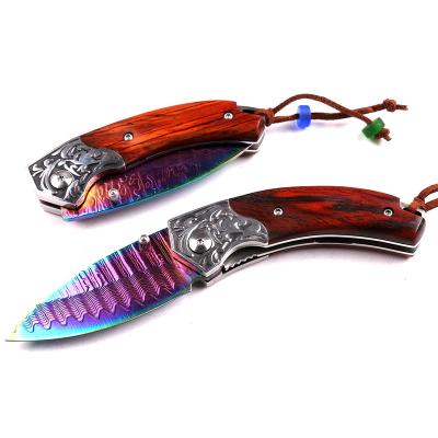 China Easy Carry Rainbow Coating Damascus Colorful Titanium Folding Pocket Knife With Yellow Sandal Wood Handle for sale