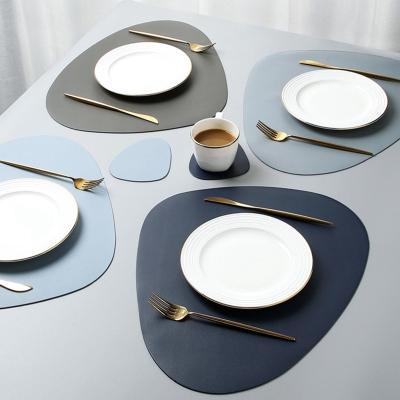 China Gray Faux Leather Placemats Irregular Customizable Placemats Stocked for Dining Table for sale