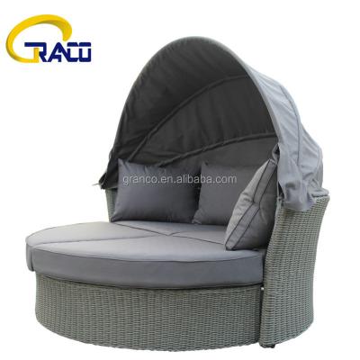 China Outdoor Rotating Sun Sofa Stool Rattan Bed With Canopy for sale