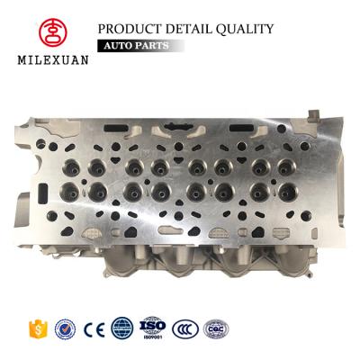 China Milexuan auto parts D4164T 908596 buy 4 valve diesel engine cylinder head sale for Volvo s60 standard for sale