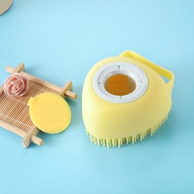 China New Stocked Item Pet Brush 2 in 1 Bath Massager Pet Bath Brush Shampoo Dispenser Silicone Shower Tool for Dog Grooming for sale