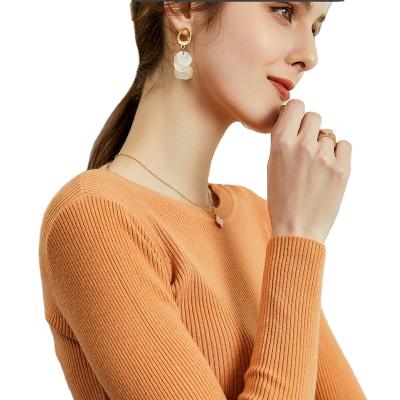 China New Style Autumn Winter Sweater Slim Fit Women's Round Sweater Solid Color Shrink Neck Suction Sweater for sale