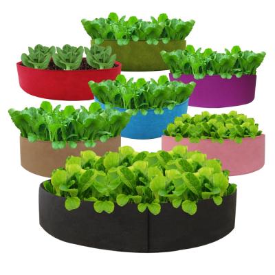 China Large Growth Cloth Raised Planting Bed Round Raised Planter Grow Bag Garden Bed Bag Vegetable Grow Bag Plant Bed for sale