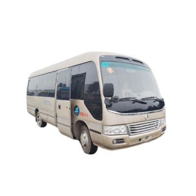 China Mini Bus Front Engine Used Diesel Coaster Transports 25-30 Seater Dragon Used Golden Bus For Sale 7000*2090*2840mm for sale