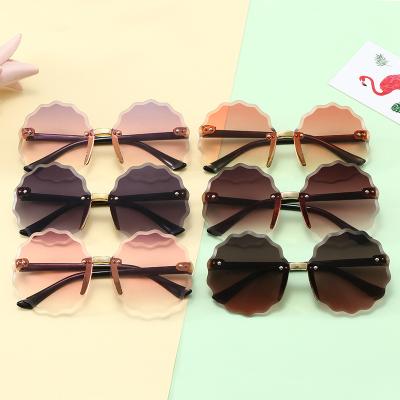 China Fashion sunglasses wholesale stylish children round high quality fashionable luxury UV400 sunglasses girls boys sunglasses for sale