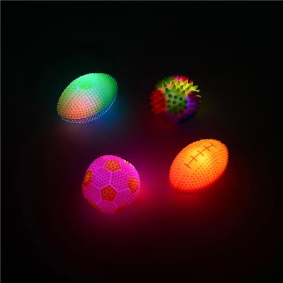 China Promotional Toy Plastic Children's Lighting Toys Stretch Football Toy Balls Massage Luminous Small Luminous Football Toys For Children for sale