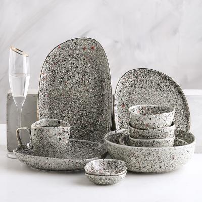 China Sustainable High End Unique Modern Stoneware Shape Luxury Dinnerware Sets With Gold Rim for sale