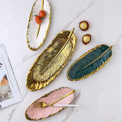 China Modern Multi Colors Wedding Decorative Feather Shapes Nordic Luxury Ceramic Decoration Serving Dish Jewelry Trays for sale