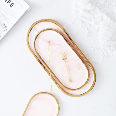 China Viable Western Style Jewelry Storage Dish Oval Pink Marbles Luxury Food Dessert Ceramic Dinner Dishes For Weddings for sale