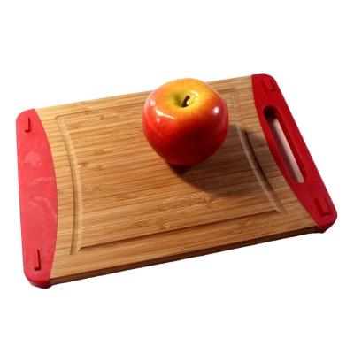 China Sustainable Premium Solid Oak Wood Kitchen Organic Bamboo Wooden Cutting Board With Non Slip for sale