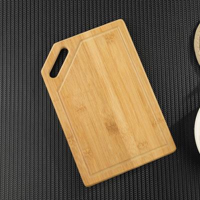 China Wholesale cheap viable best quality bamboo chopping chopping board with handles for sale