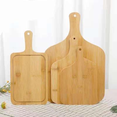 China Sustainable Fruit and Vegetable Wooden Bamboo Cutting Board with Handle for sale