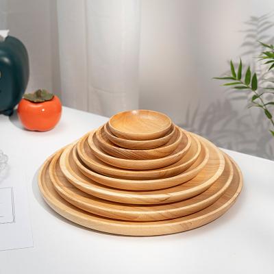 China Sustainable Rubber Wood Disc Japanese Style Fruit Saucer Snack Hotel Household Dinner Tea Tray Design Fibre Hot Wooden Plate for sale