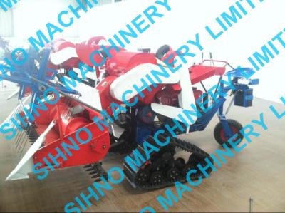 China 4L-0.7 mini paddy combine harvester with crawler for sale