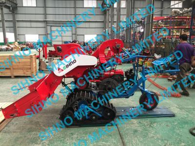 China 4LZ-0.7 mini paddy combine harvester with crawler, rice wheat 14HP for sale