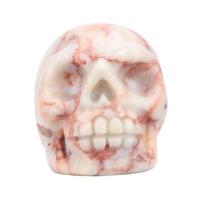 China Supply items wholesale natural carved red and white stripes gemstone skulls jewelry, can be customized various gemstone carved crafts for sale