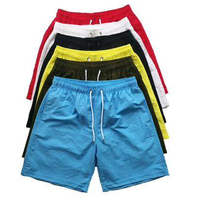 China Free Sample Breathable Custom Logo Dropshipping Men's Swim Trunks Swimwear Beach Shorts Waterproof Quick Dry Shorts for sale