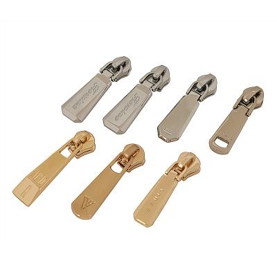 China Custom Fashion Apparel Slider Brand Decorative Metal Zipper Puller Other Logo Metal Zipper Puller for sale